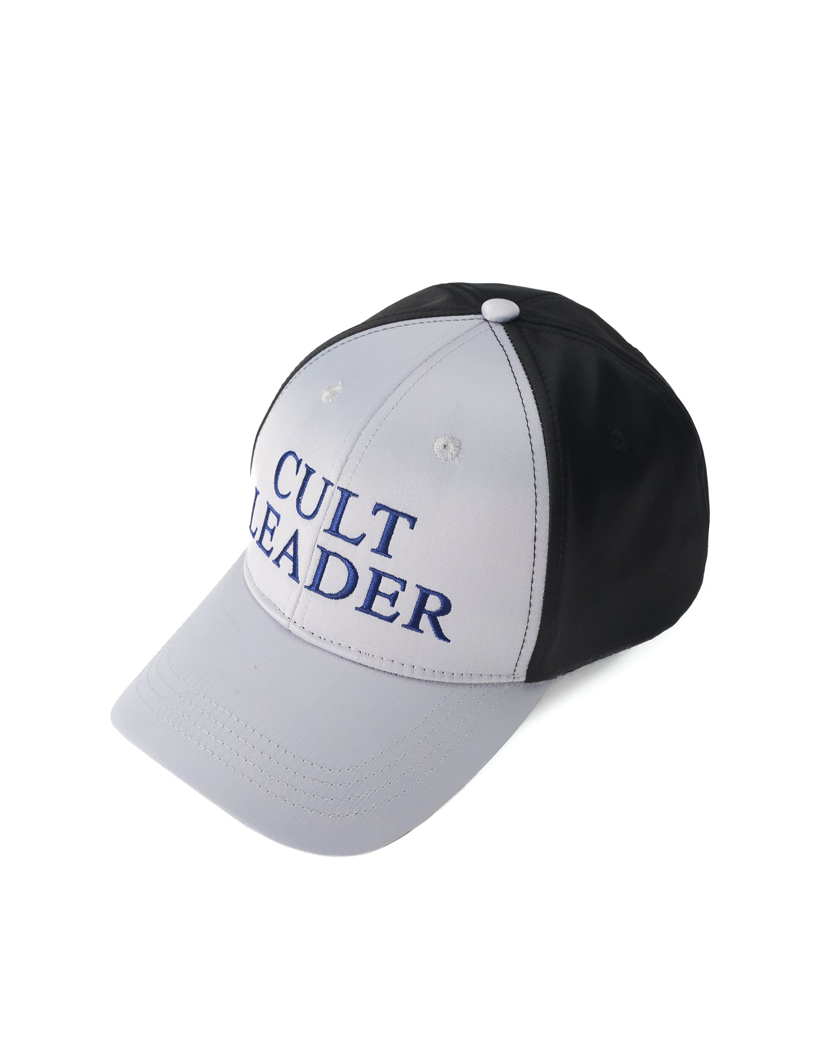 A two-tone baseball cap with a light gray front and brim, black back panels, and blue embroidered text reading 'CULT LEADER' on the front, shown on a plain white background.